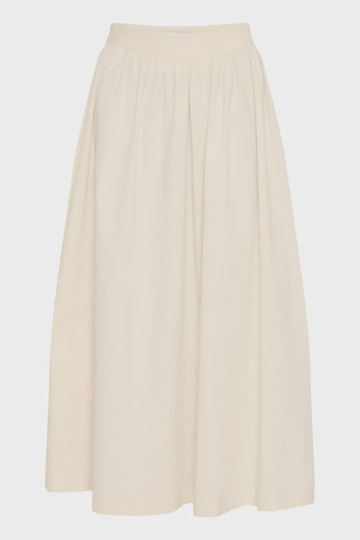 cream midi skirt with light pleating at the waistband