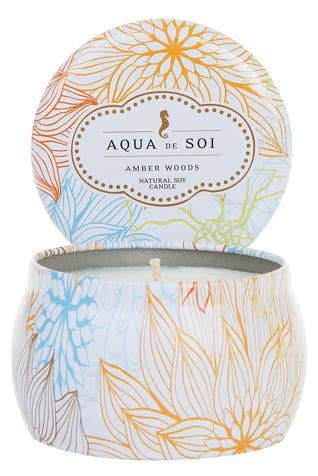 Aqua de Soi candle with floral design on a white background