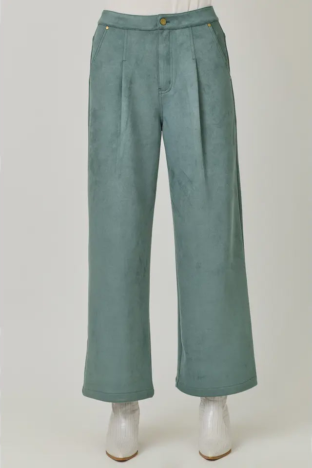 Green wide-leg pants on a white background