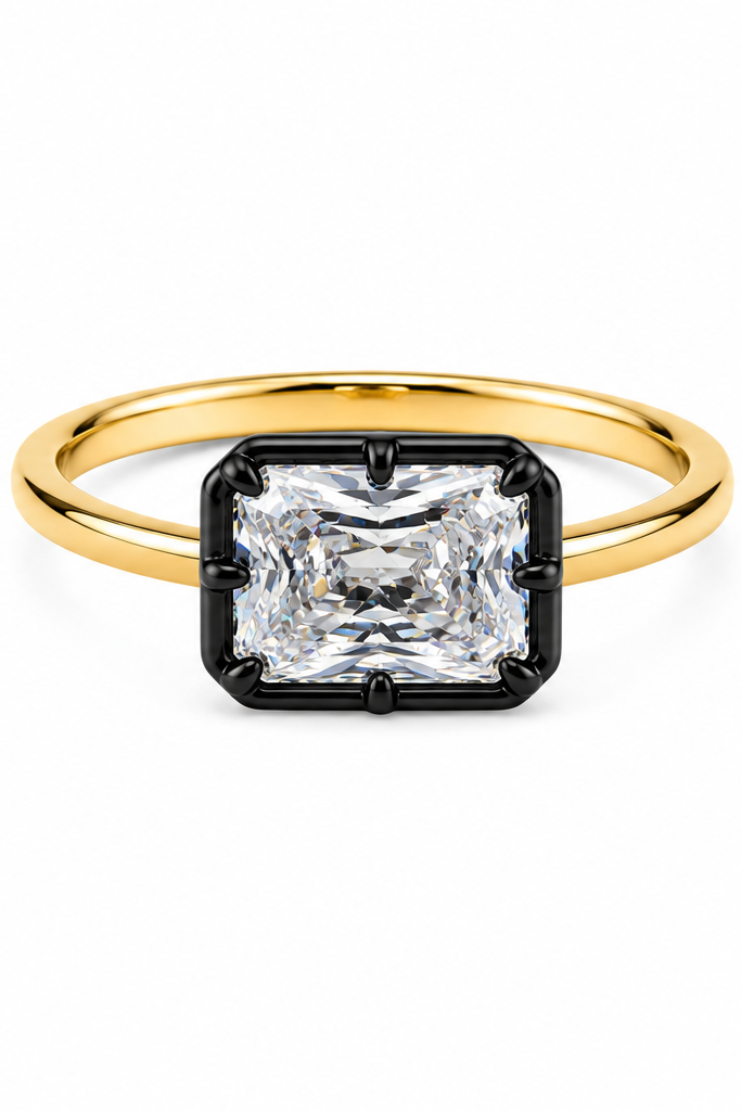 Gold ring with a large diamond on a white background