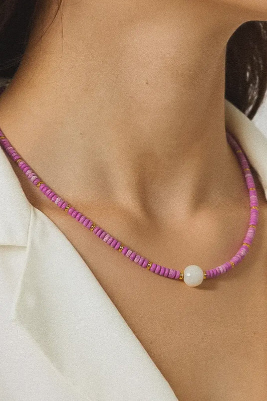purple boho beaded necklace with center pearl bead