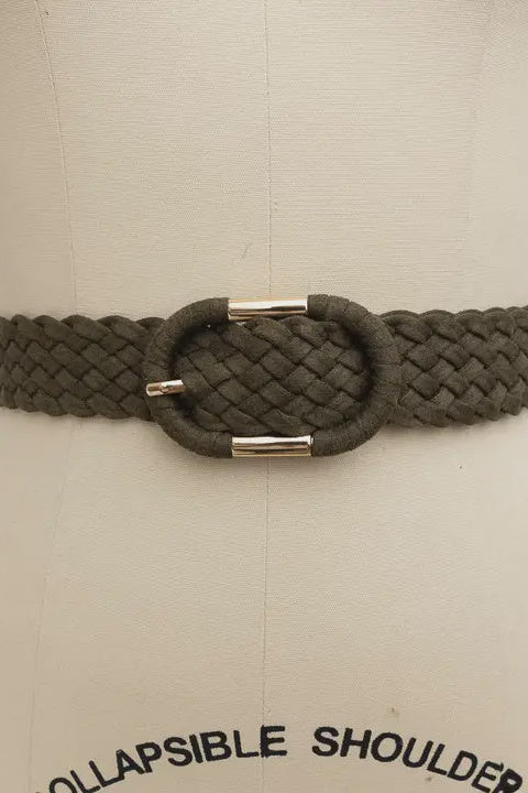 Green braided belt with a gold buckle on a mannequin with 'Collapsible Shoulder' text.