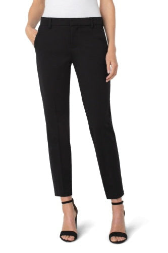 Person wearing black pants on a white background