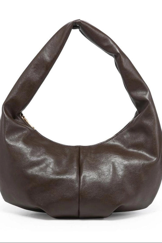 Brown leather handbag on a white background