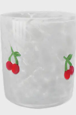 Clear glass tumbler with cherry design on a white background