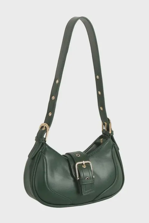 Green handbag with a strap on a light gray background