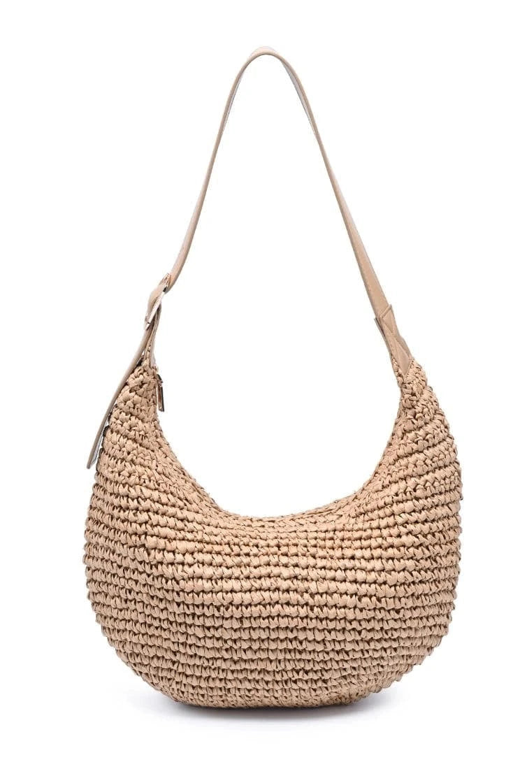 Beige woven handbag on a white background