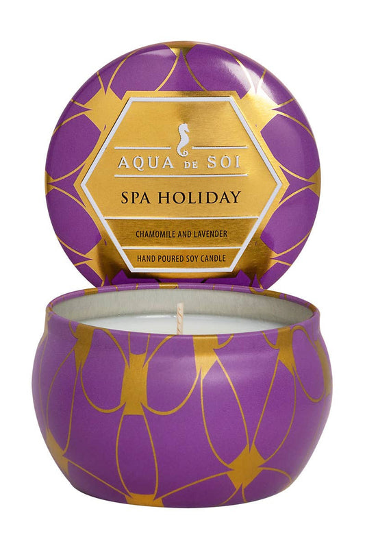 Purple and gold candle with 'Aqua de Soi' branding on a white background