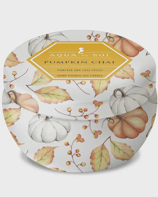 Candle packaging with pumpkin and leaf design on a white background