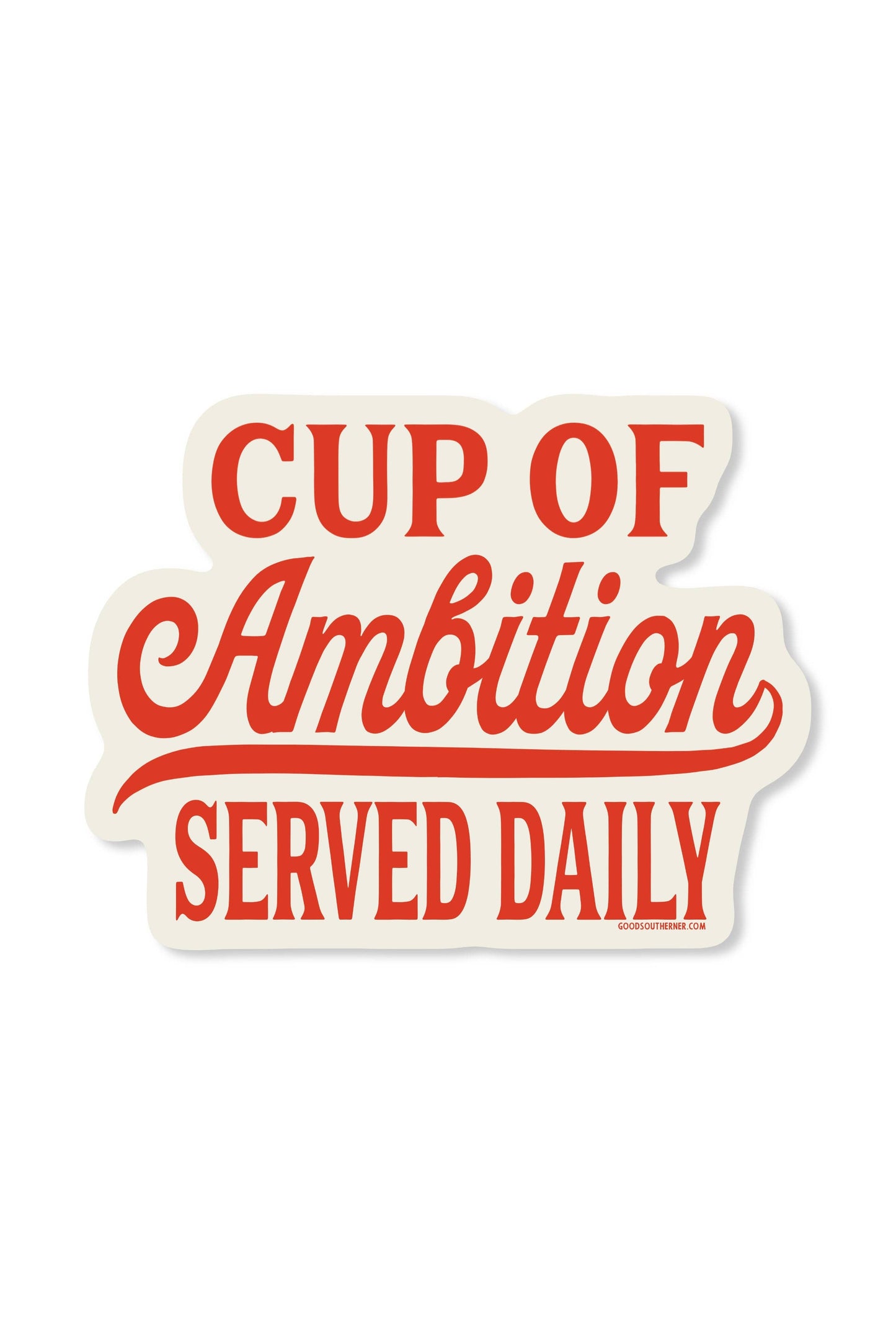 A die-cut sticker with the phrase 'CUP OF Ambition SERVED DAILY' in red lettering on an off-white background, shown on a plain white studio background.
