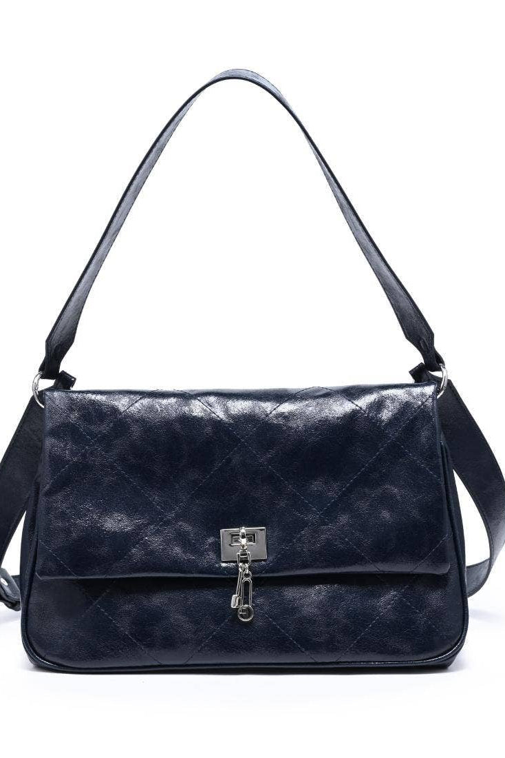 A dark navy blue quilted leather shoulder bag with a silver-toned turn-lock clasp and a long shoulder strap, shown against a plain white background.