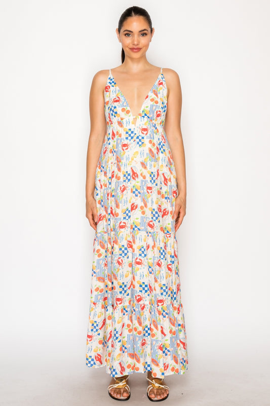 Woman wearing a colorful patterned dress on a white background