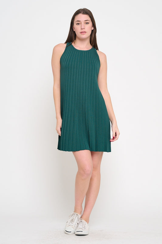 Woman wearing a green dress on a white background