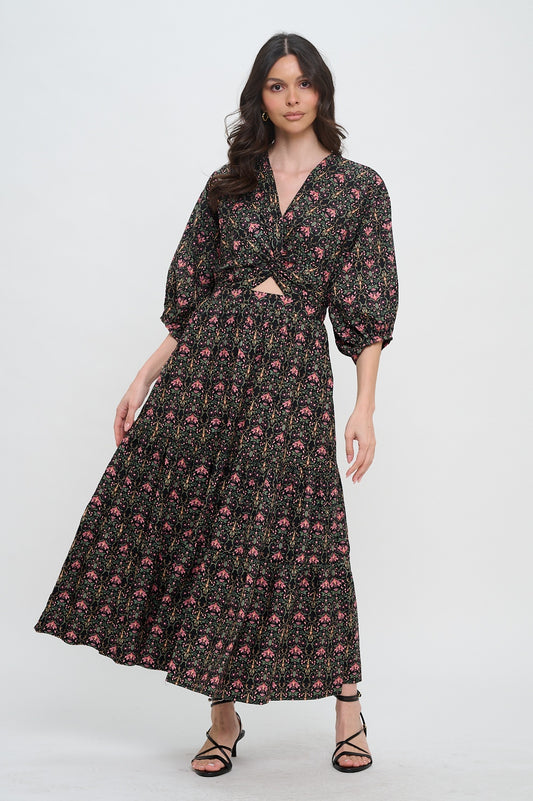 Woman wearing a black floral dress on a white background