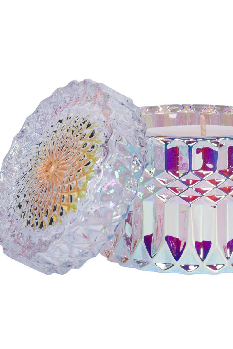 Iridescent glass candle holder with geometric design on a white background