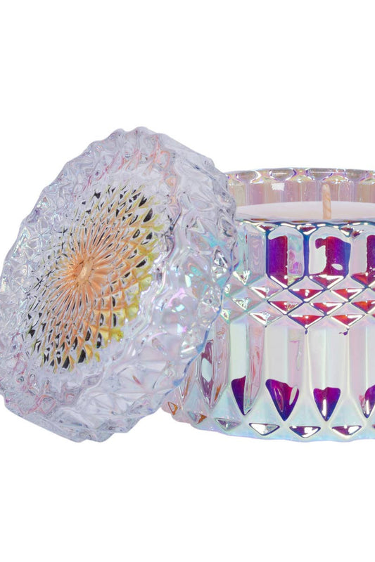 Iridescent glass candle holder with geometric design on a white background