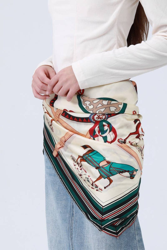 Person holding a patterned bag with a white background