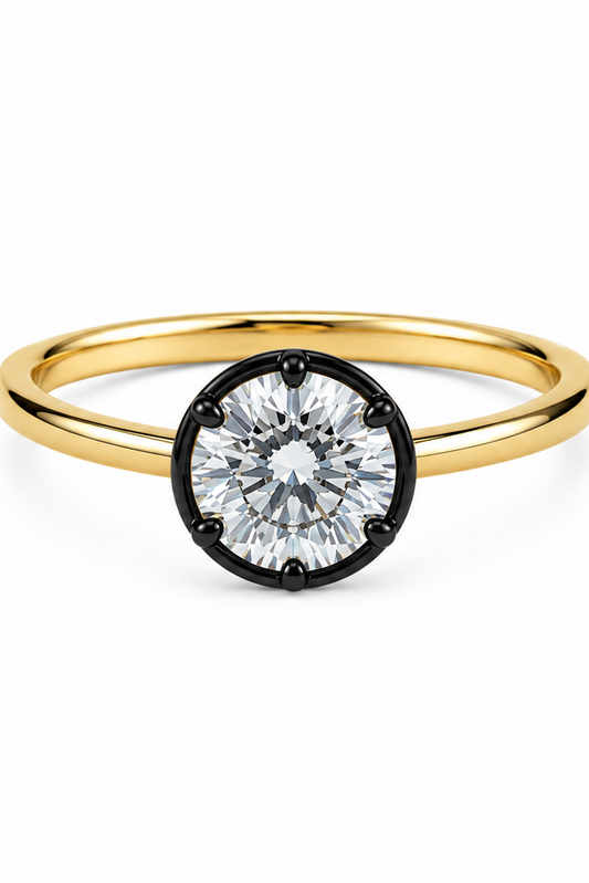 Gold ring with a diamond on a white background