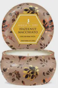 Decorative container with lid featuring floral design and product label on a light gray background