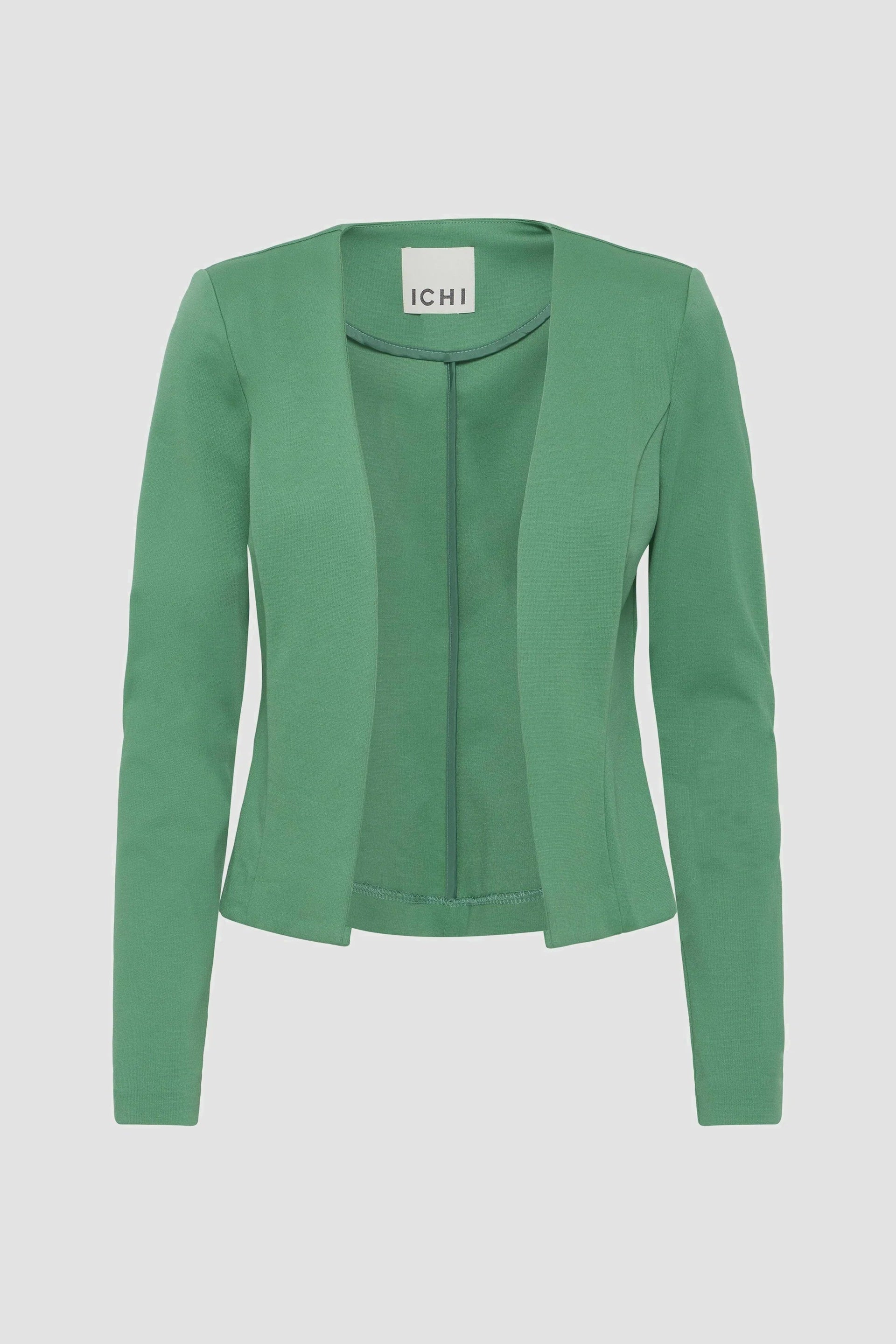 Green cardigan on a light gray background
