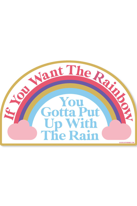 A die-cut sticker featuring a rainbow with pink clouds and the text 'If You Want The Rainbow You Gotta Put Up With The Rain' on a white background.