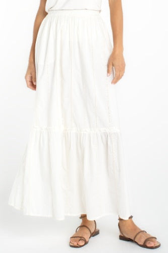 White dress worn by a person on a white background