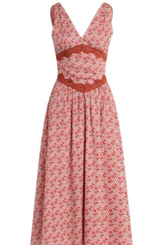 A sleeveless V-neck maxi dress with a dense pink and white floral pattern, featuring a rust-colored lace band at the waist and a matching lace detail at the bust, shown against a plain white background.