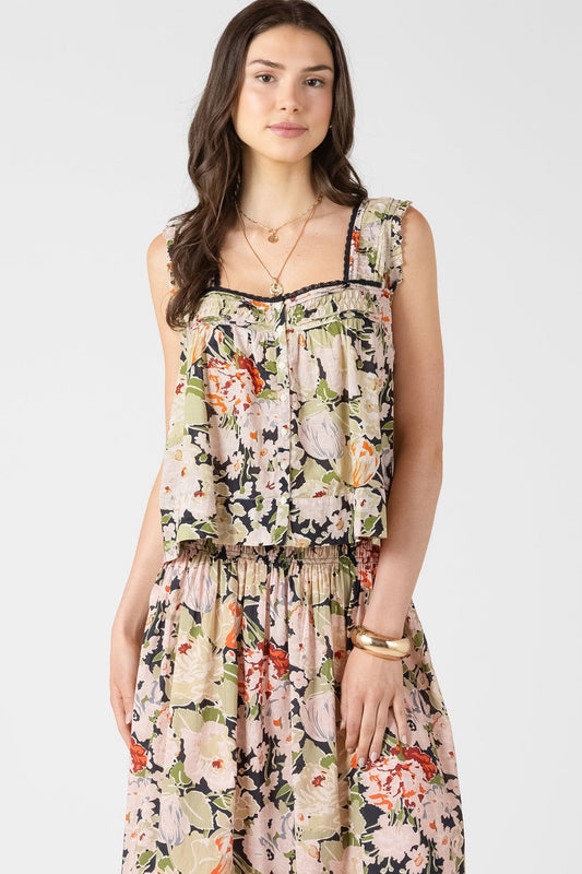 Woman wearing a floral dress on a white background