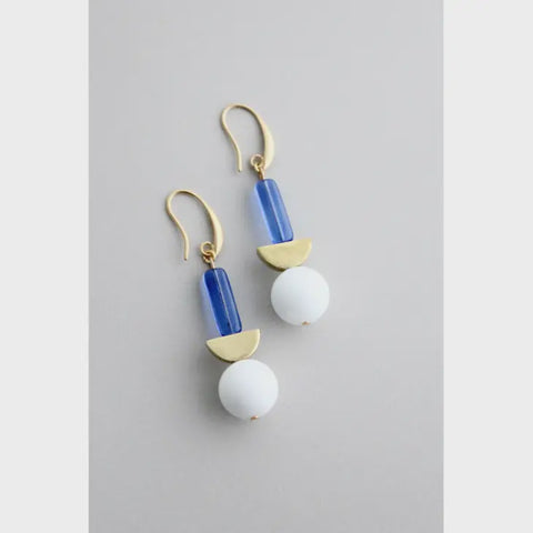 white and blue earrings